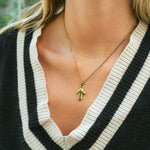 Collier Croix Doré aux Formes Arrondies