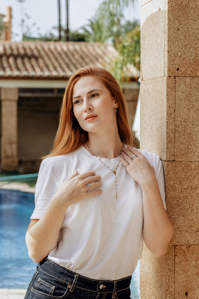 Religious necklace with pendant cross of the Virgin Mary