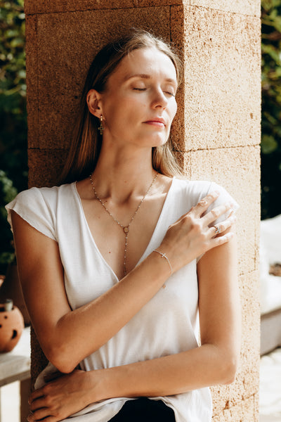 Religious necklace with pendant cross of the Virgin Mary