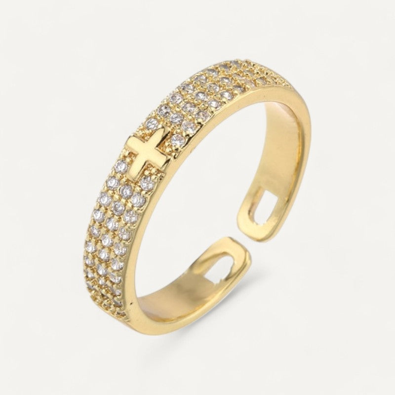 Delicate ring sparkling cross