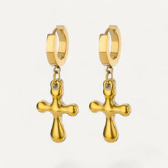 Glänzende goldene Kreuzohrringe