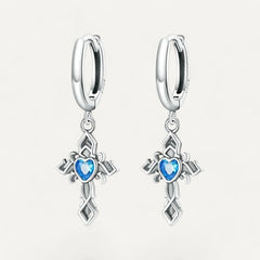 Ohrringe Kreuz mit blauen Diamanten