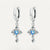 Boucles d'Oreilles Croix Diamants Bleus