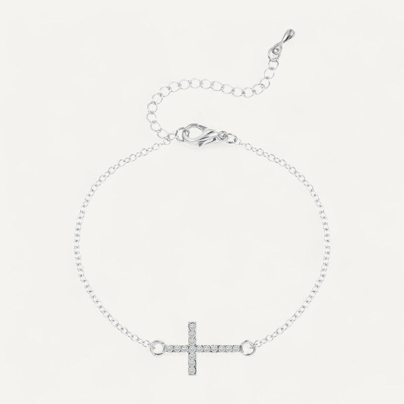 Silver bracelet with cross decorated with crystals