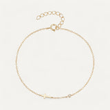 Armband mit Kreuz und Edelstein