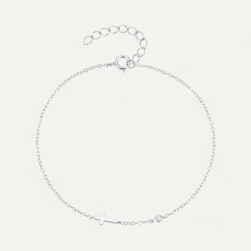 Cross bracelet with precious stone