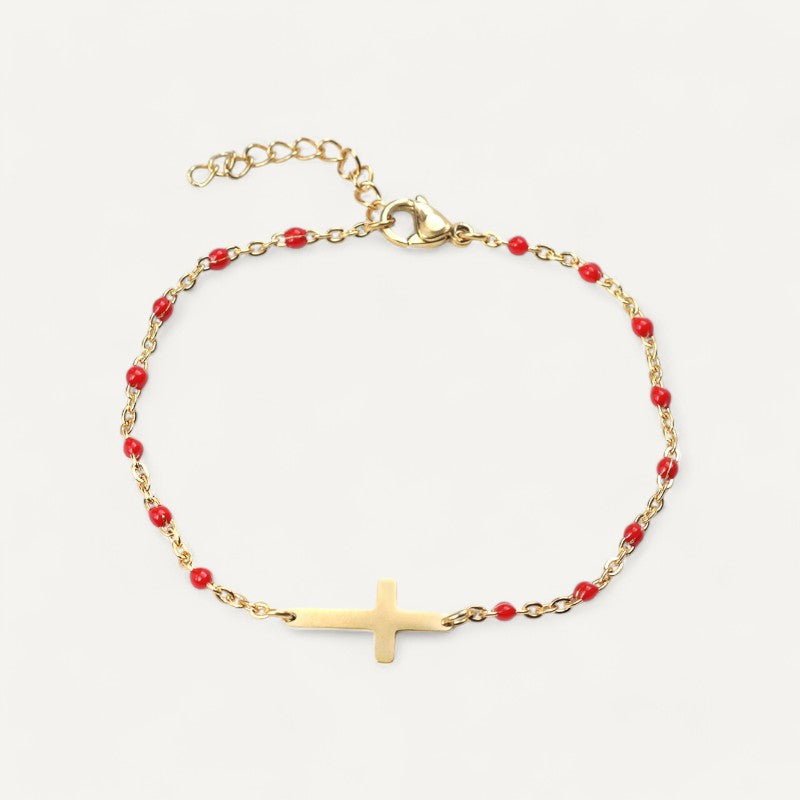 Golden cross bracelet with pearls