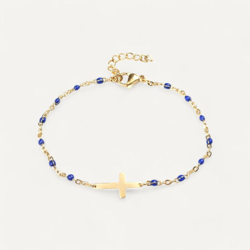 Golden cross bracelet with pearls