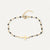 Golden cross bracelet with pearls