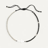 Standing charms bracelet with silver cross