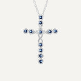 Kreuzanhänger mit blauen Zirkon-Kristallen