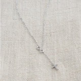 Cross necklace with infinite symbol