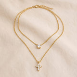Collier Croix Double Éclat