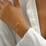Bracelet Croix Dorée & Perles Élégantes