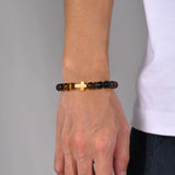 Tiger's eye and golden cross bracelet