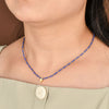 Glass bead necklace with cross pendant