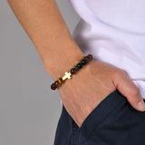 Tiger's eye and golden cross bracelet