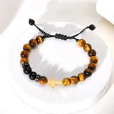 Tiger's eye and golden cross bracelet