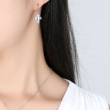 Petite Boucle d'Oreille Croix Pendante